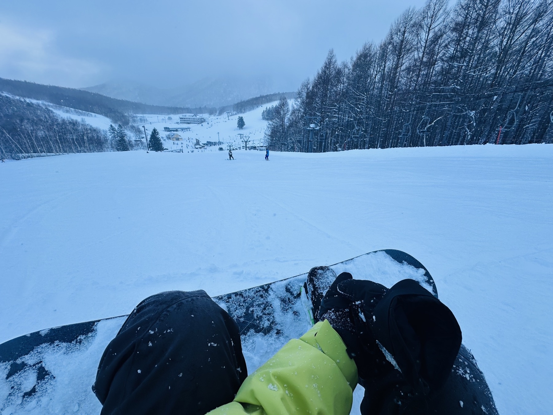 Snowboard resting on a slope at Sapporo Teine